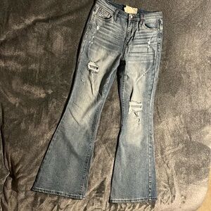 medium wash flare/wide leg ripped jeans